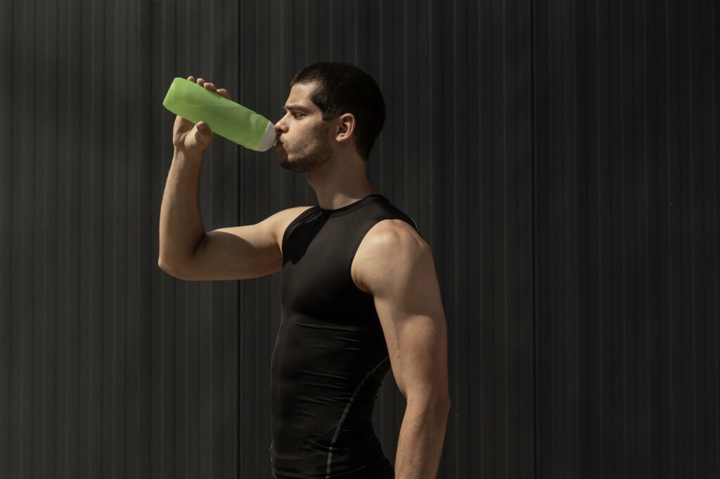 Man drinking pre-workout shake